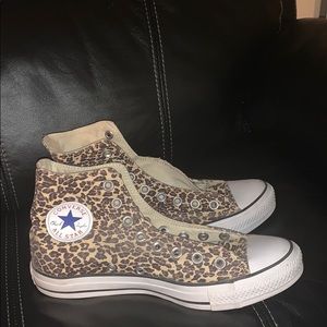 Used Cheetah Converse shoes with no laces